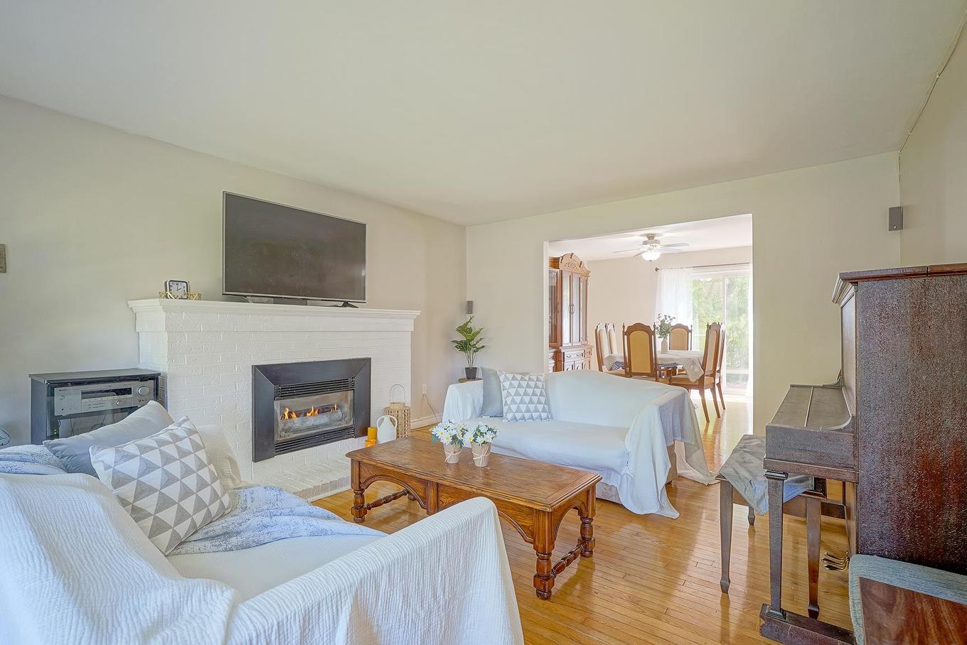 14 St. Catherines Avenue, Stratford, PE - Indoor Photo Showing Living Room With Fireplace