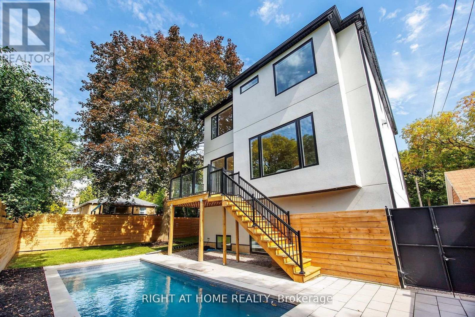 Rear Exterior - 120 Hammell Street, Toronto, ON - Outdoor With In Ground Pool