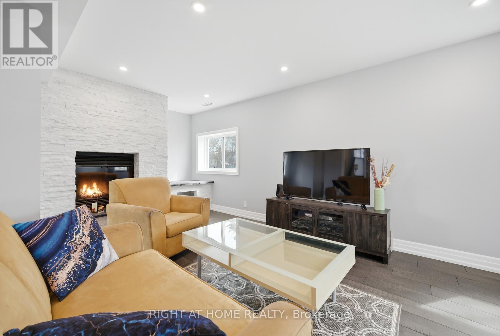 5885 7Th Line, New Tecumseth, ON - Indoor Photo Showing Living Room With Fireplace