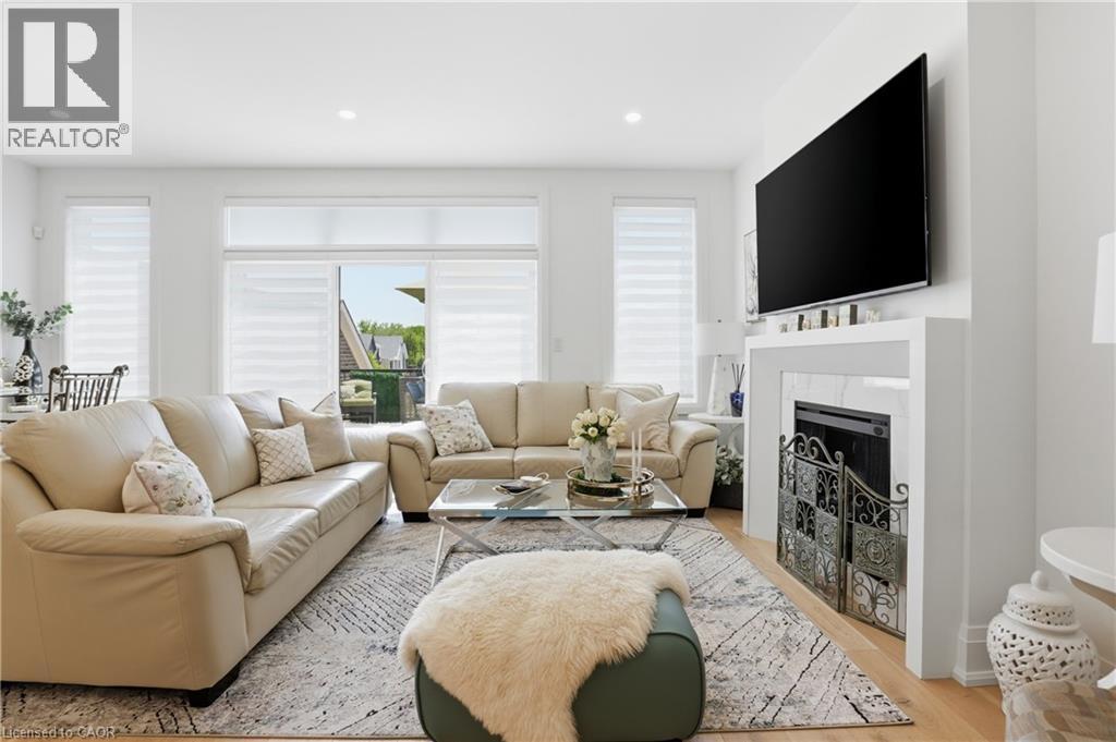 24 Willow Bank Common, St. Catharines, ON - Indoor Photo Showing Living Room With Fireplace