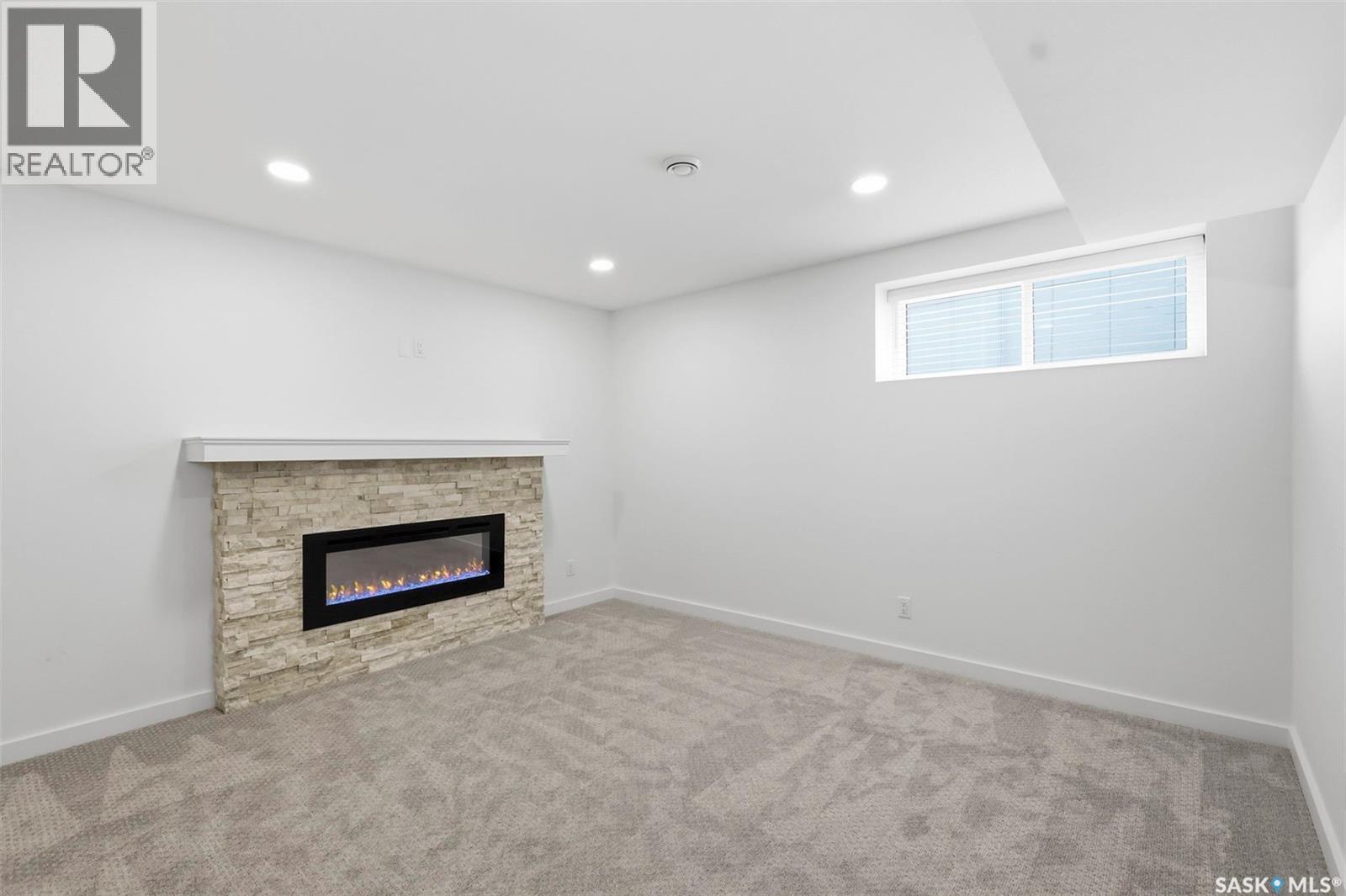 104 Forsey Avenue, Saskatoon, SK - Indoor With Fireplace