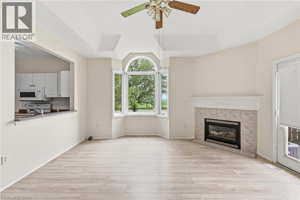 98 Sunibel Drive E, Glanbrook, ON - Indoor Photo Showing Living Room With Fireplace