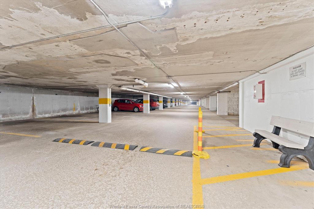 1110-8591 Riverside Drive East, Windsor, ON - Indoor Photo Showing Garage