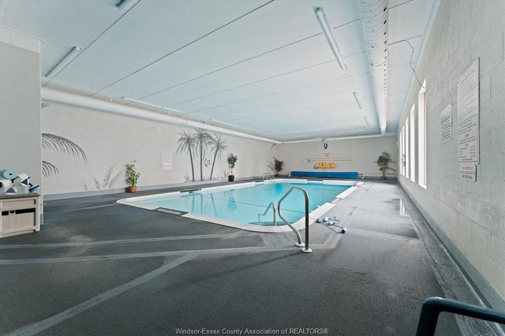 1110-8591 Riverside Drive East, Windsor, ON - Indoor Photo Showing Other Room With In Ground Pool