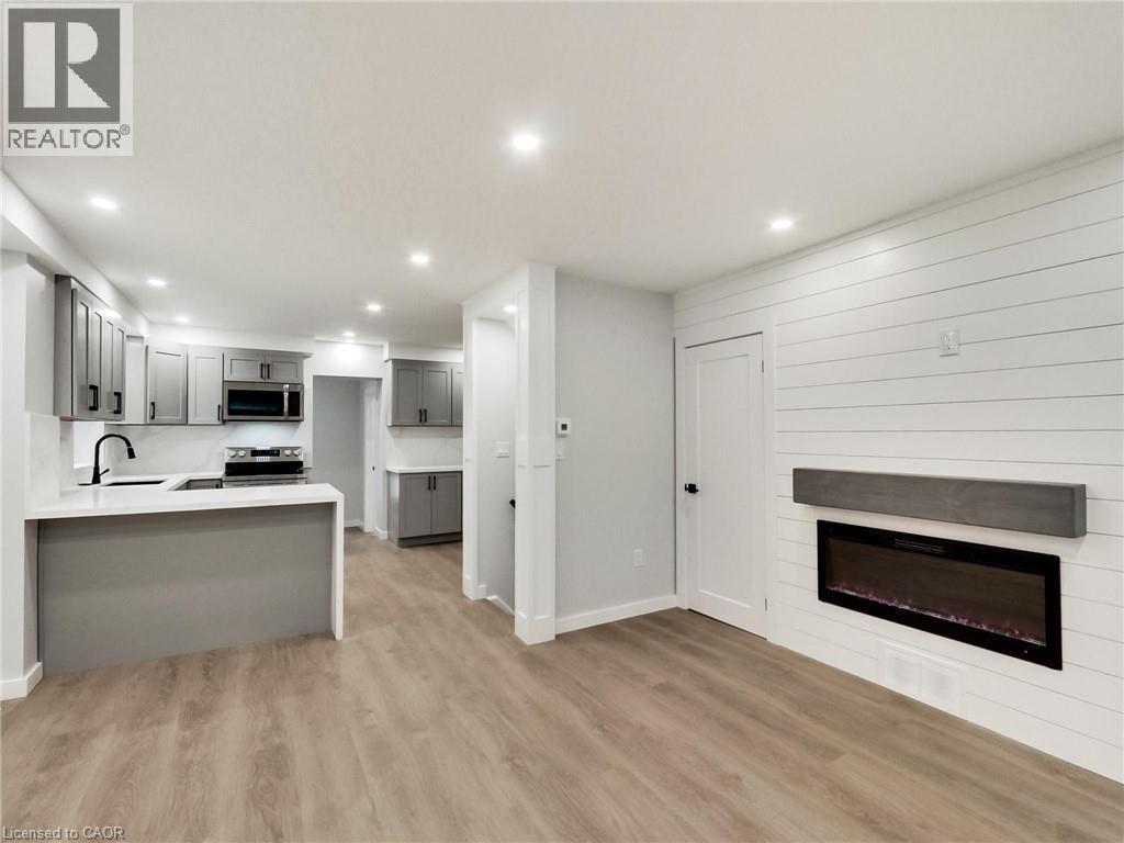 67 Cope Street, Hamilton, ON - Indoor With Fireplace