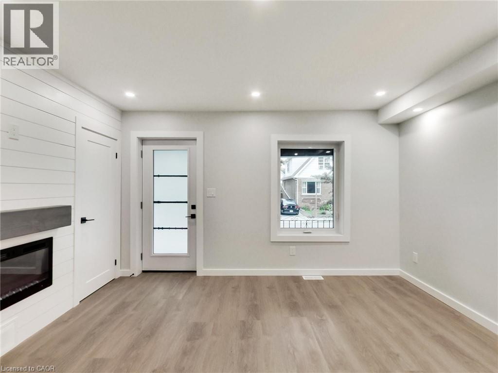 67 Cope Street, Hamilton, ON - Indoor With Fireplace