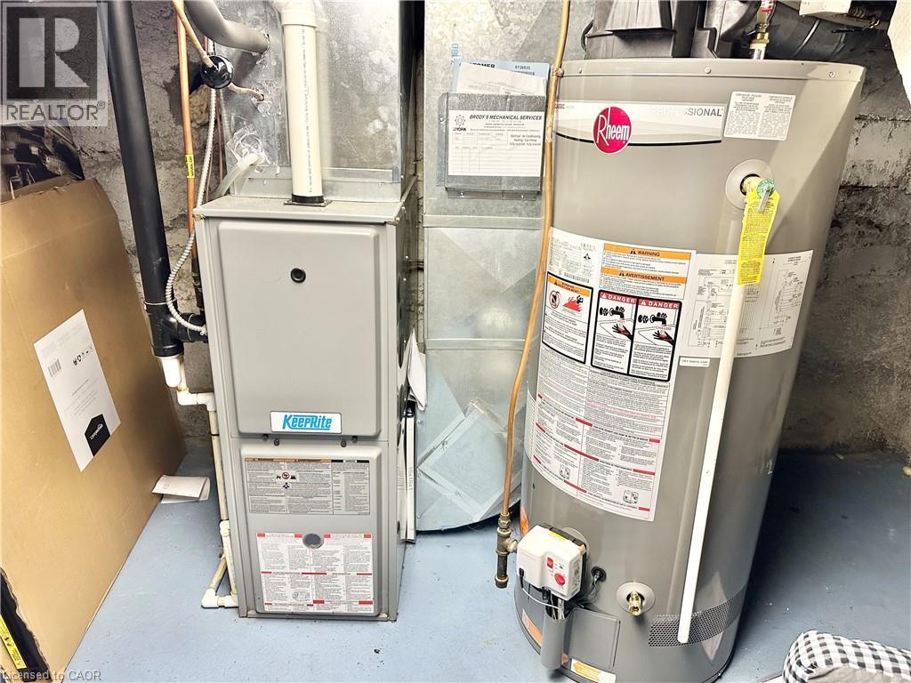 Water heater and furnace - 88 Brook Street, Simcoe, ON - Indoor Photo Showing Basement