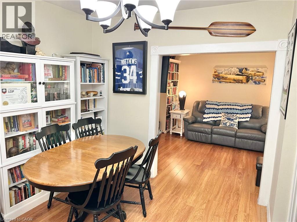Bright dining area featuring wood-finish flooring - 88 Brook Street, Simcoe, ON - Indoor Photo Showing Dining Room