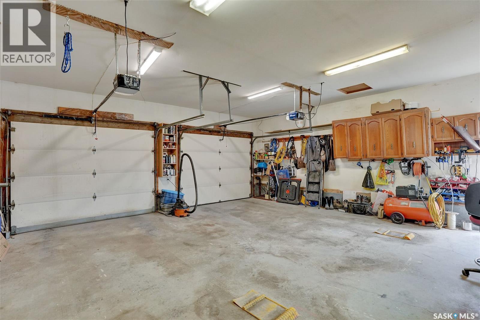 246/242 Westview Drive, Balgonie, SK - Indoor Photo Showing Garage
