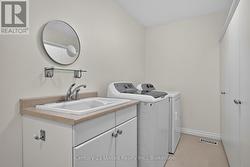 main - laundry room, access to garage -