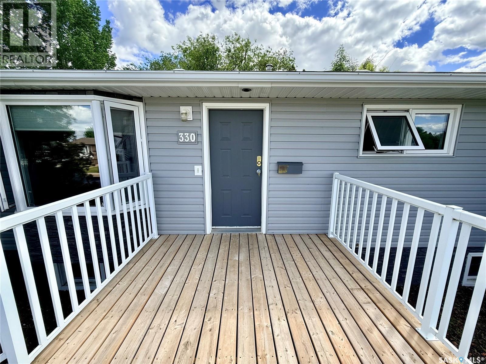 330 Aspen Drive, Swift Current, SK - Outdoor With Deck Patio Veranda With Exterior