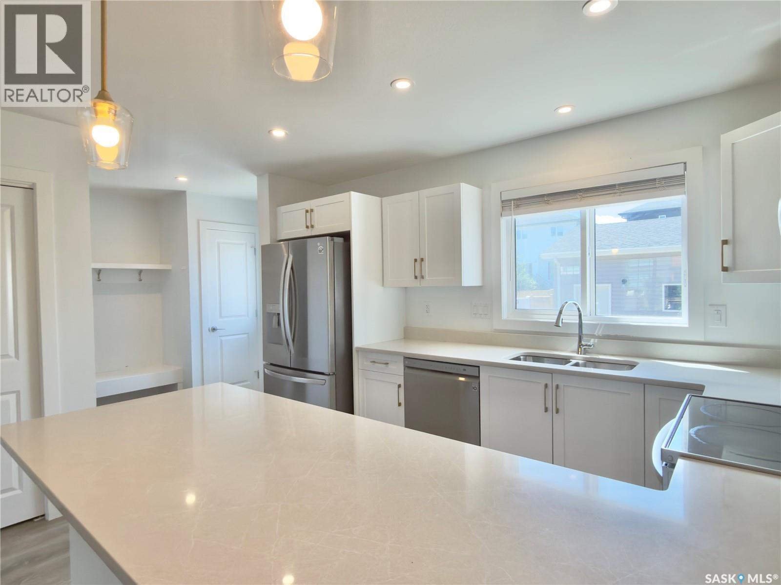 128 Westfield Road, Saskatoon, SK - Indoor Photo Showing Kitchen With Stainless Steel Kitchen With Double Sink