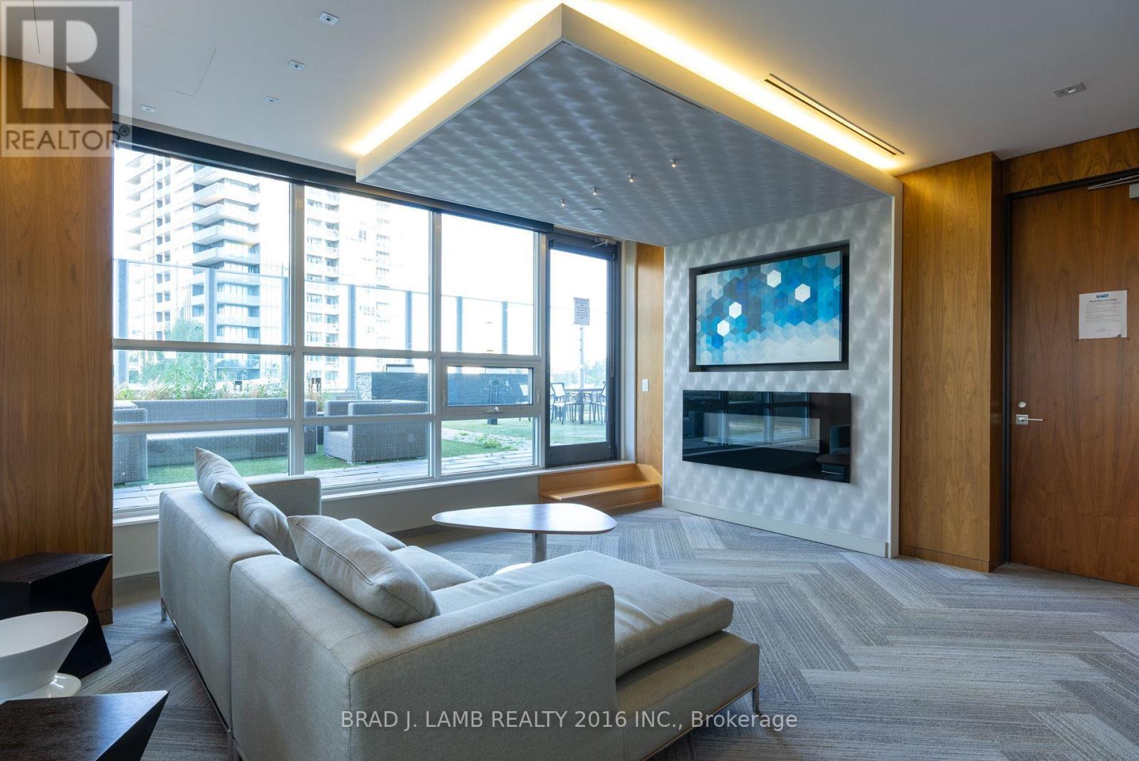 #4303 - 36 Park Lawn Road, Toronto, ON - Indoor Photo Showing Living Room With Fireplace