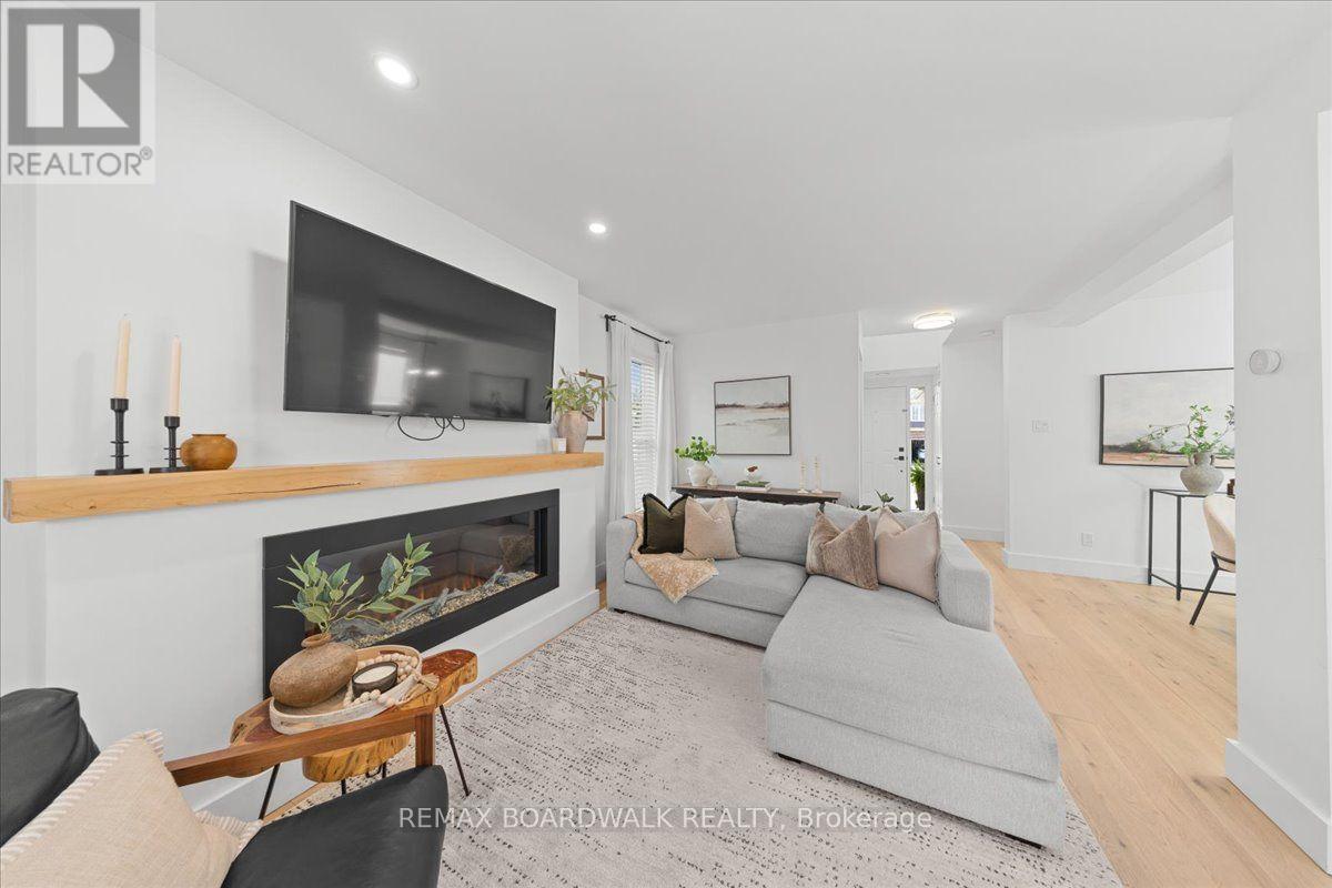 43 Peacock Crescent, Ottawa, ON - Indoor Photo Showing Living Room With Fireplace