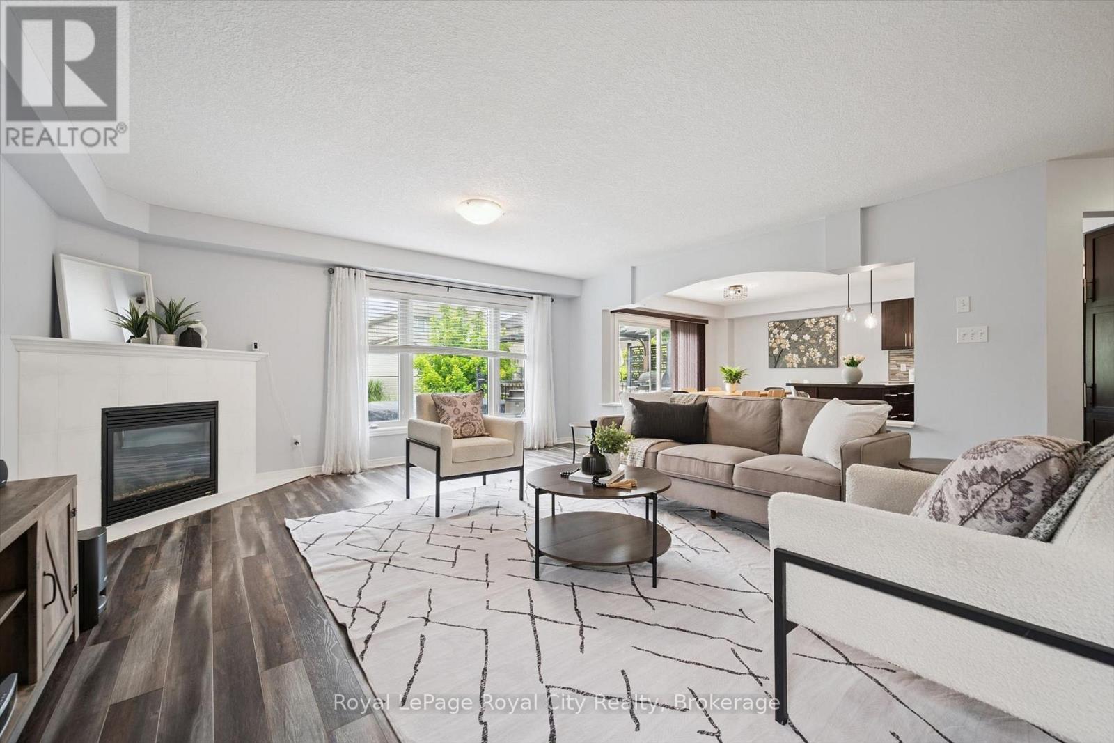 138 Flanders Road, Waterloo, ON - Indoor Photo Showing Living Room With Fireplace