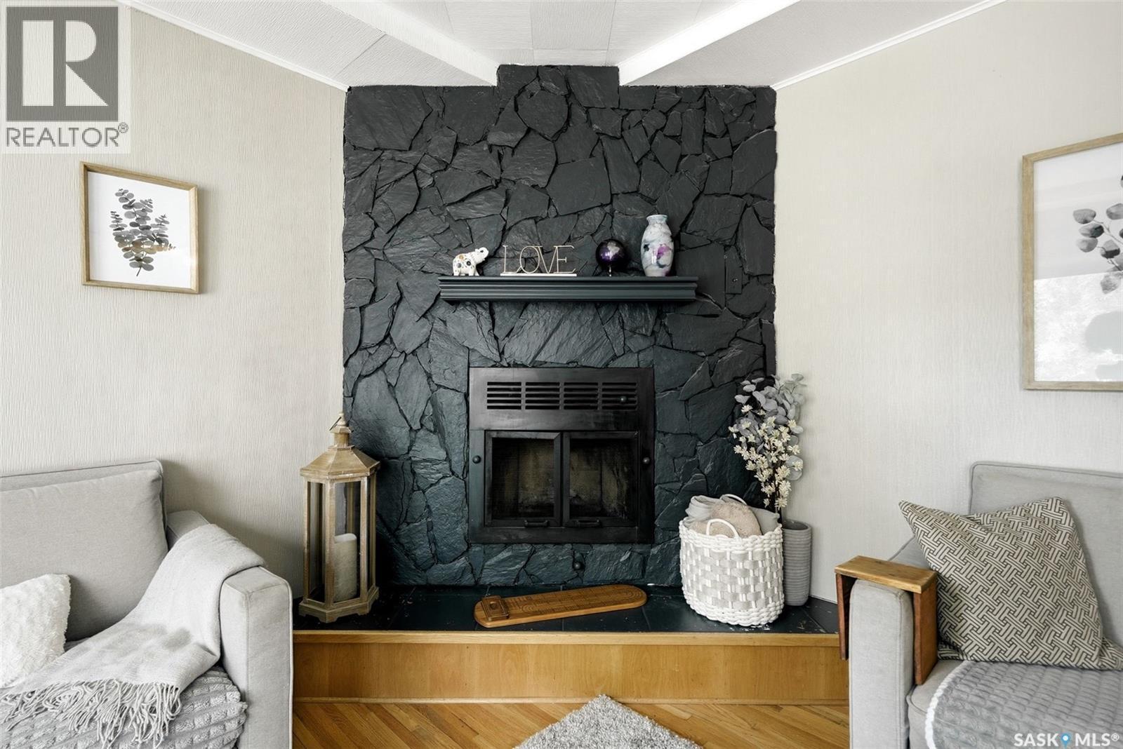 408 Mullin Avenue E, Regina, SK - Indoor Photo Showing Living Room With Fireplace