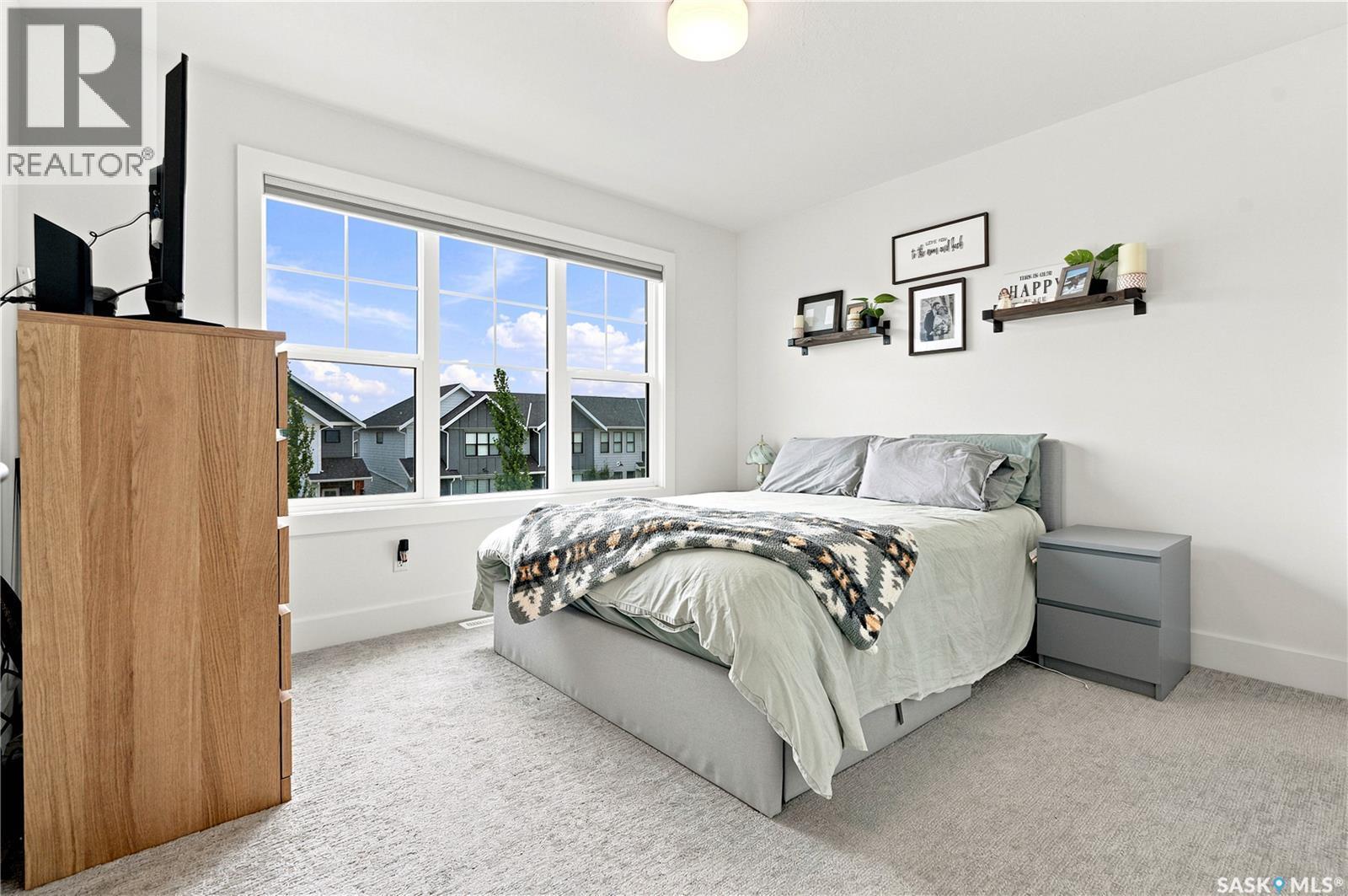 178 Rosewood Boulevard E, Saskatoon, SK - Indoor Photo Showing Bedroom
