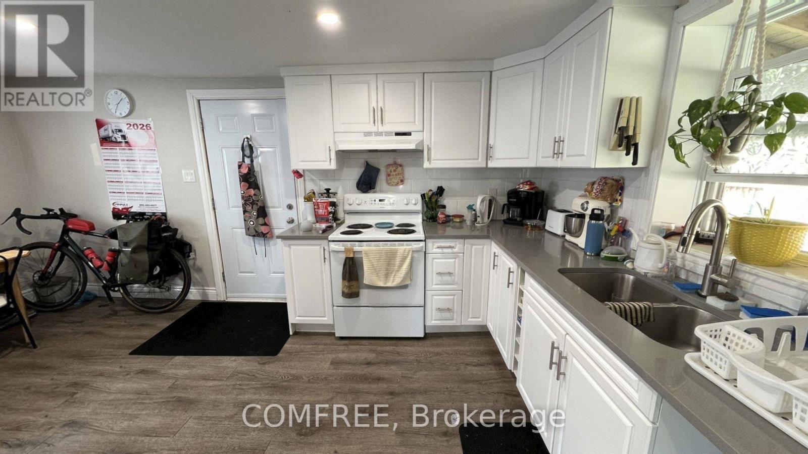 21 Monroe Avenue, Cornwall, ON - Indoor Photo Showing Kitchen With Double Sink
