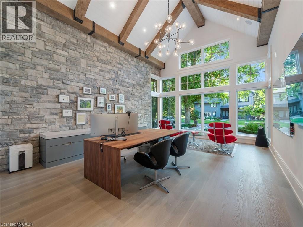 Vaulted ceiling featuring exposed wood beams and architectural lighting - 140 Secord Lane, Burlington, ON - Indoor Photo Showing Office