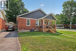 Brick and vertical plank siding exterior -