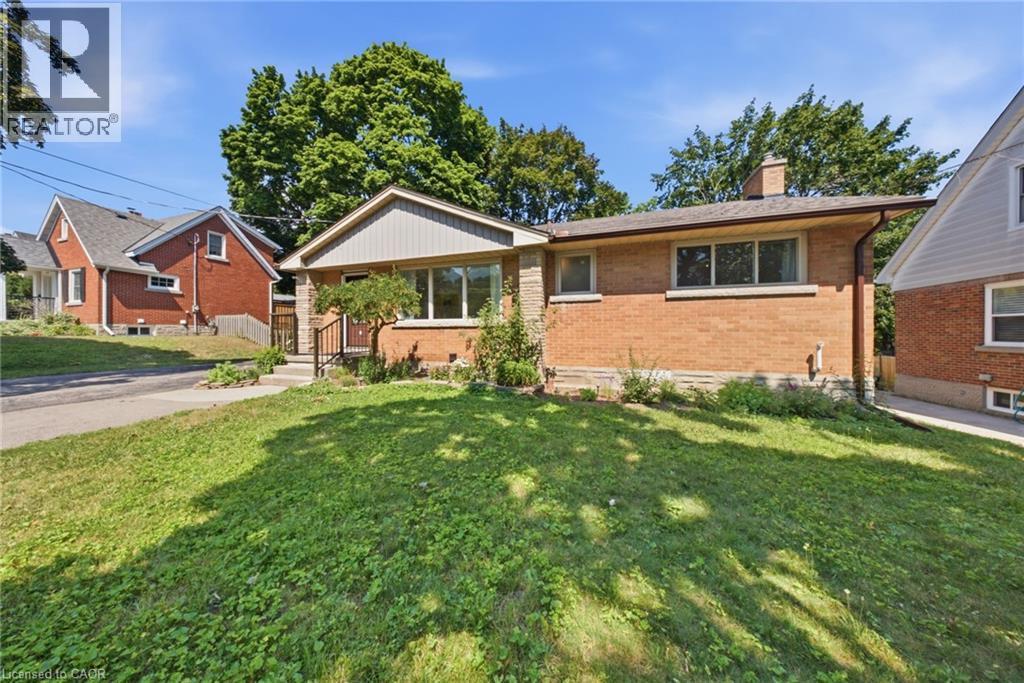 Brick and stone exterior with a prominent front-facing window - 80 Jackson Avenue, Kitchener, ON - Outdoor