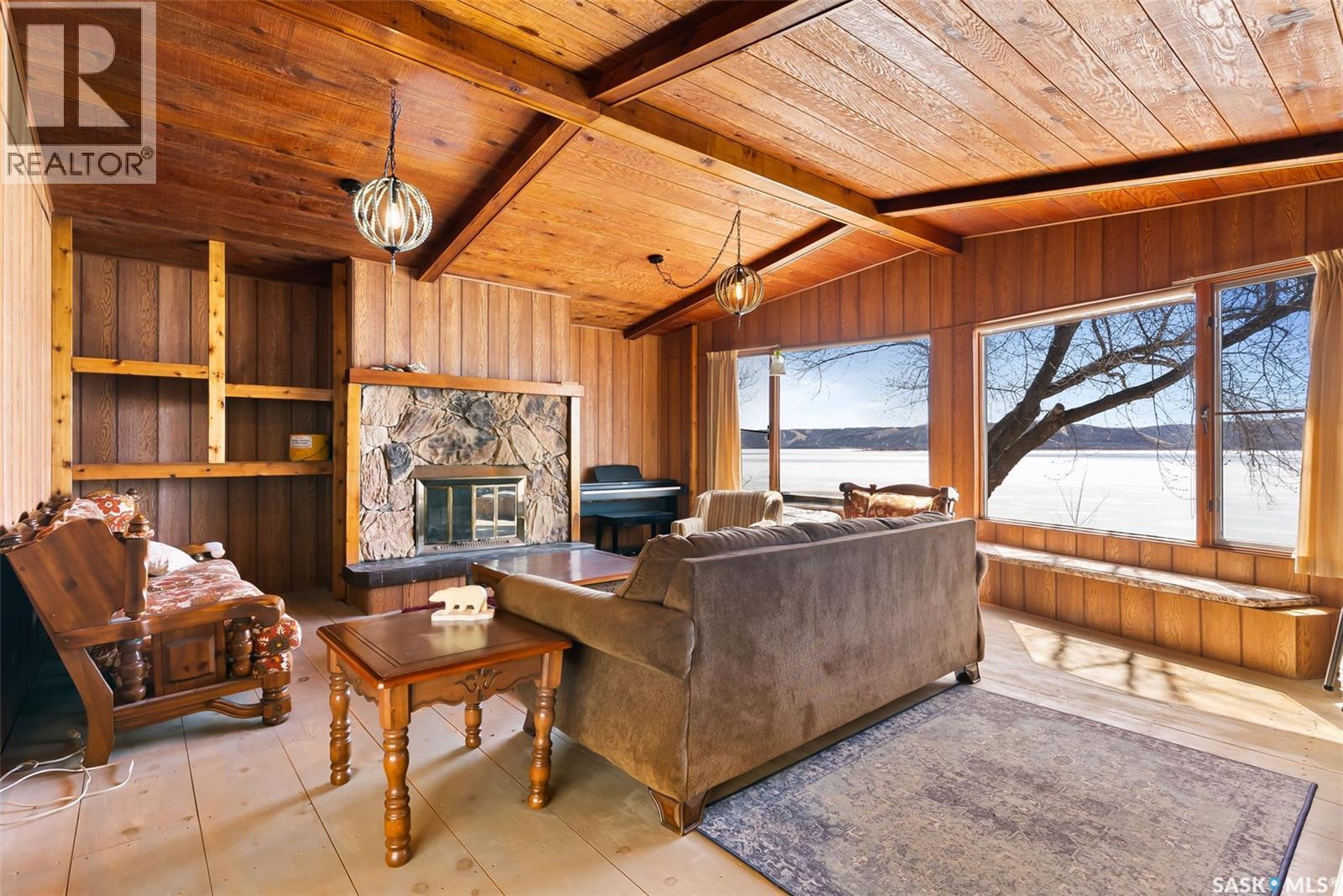 446 Pasqua Lake Road, North Qu'Appelle Rm No. 187, SK - Indoor Photo Showing Other Room With Fireplace