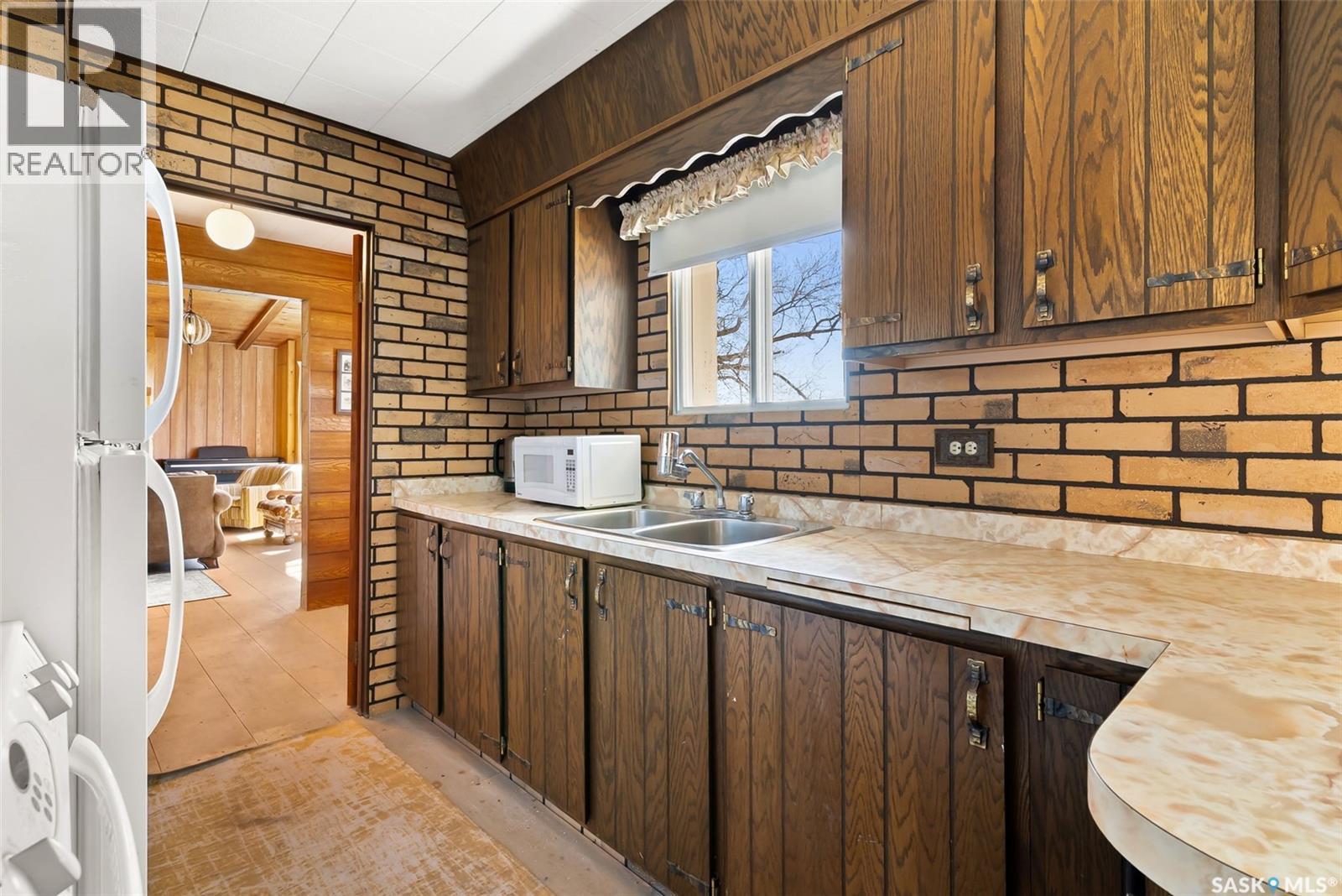 446 Pasqua Lake Road, North Qu'Appelle Rm No. 187, SK - Indoor Photo Showing Kitchen With Double Sink