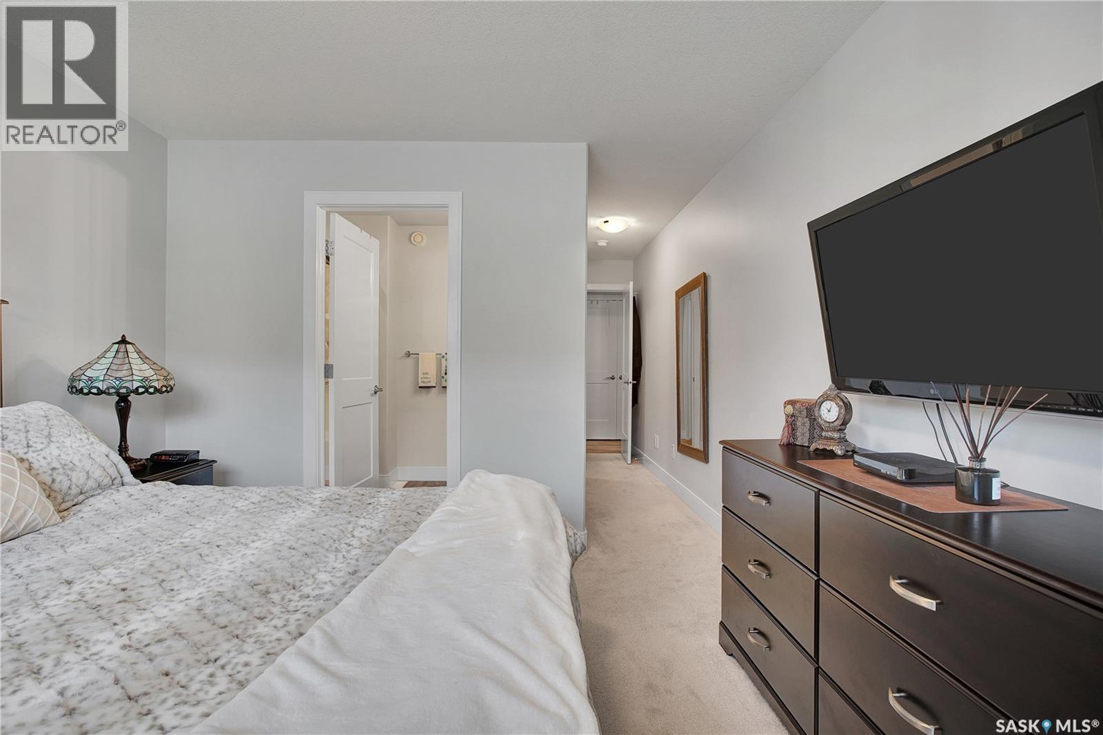 4 437 Palmer Crescent, Warman, SK - Indoor Photo Showing Bedroom