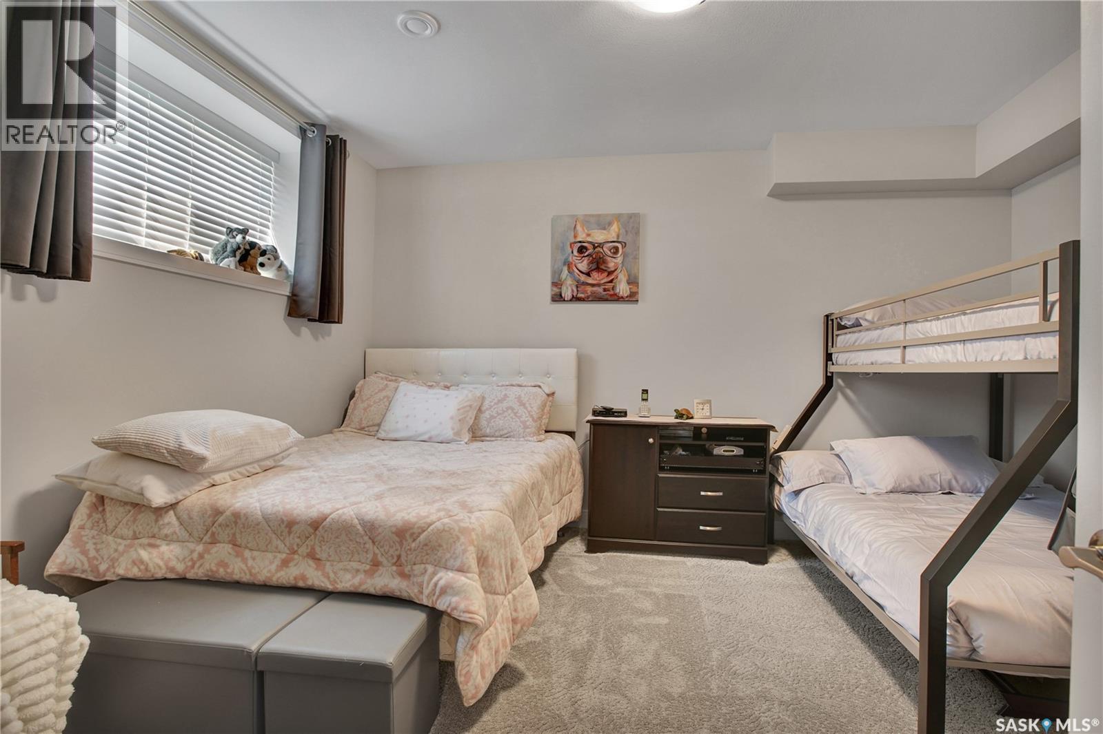 4 437 Palmer Crescent, Warman, SK - Indoor Photo Showing Bedroom