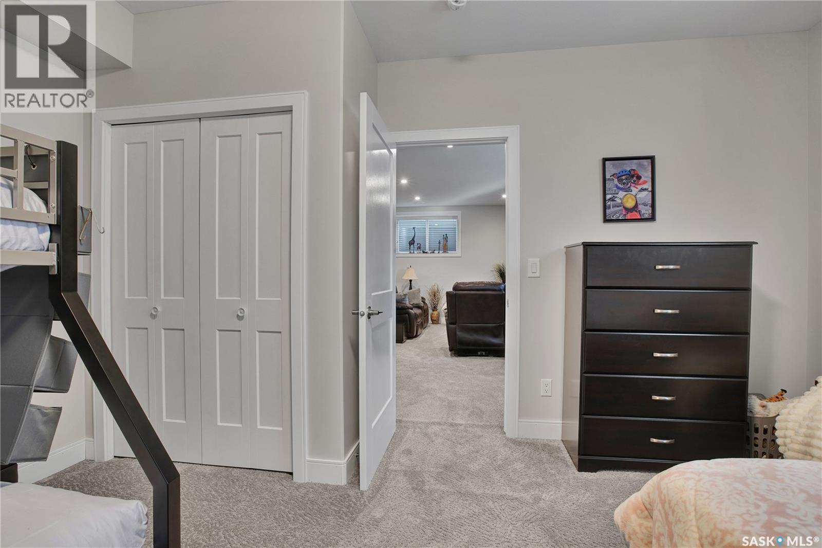 4 437 Palmer Crescent, Warman, SK - Indoor Photo Showing Bedroom