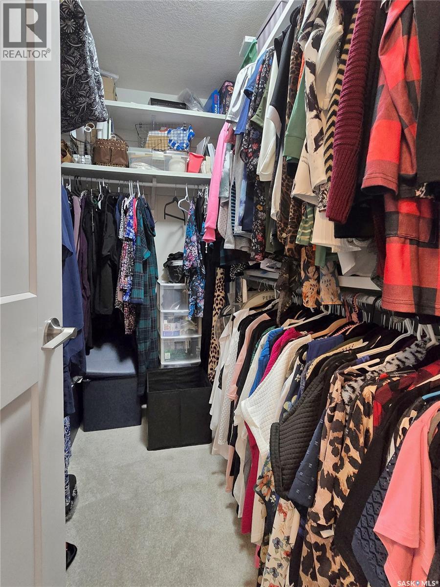 4 437 Palmer Crescent, Warman, SK - Indoor With Storage