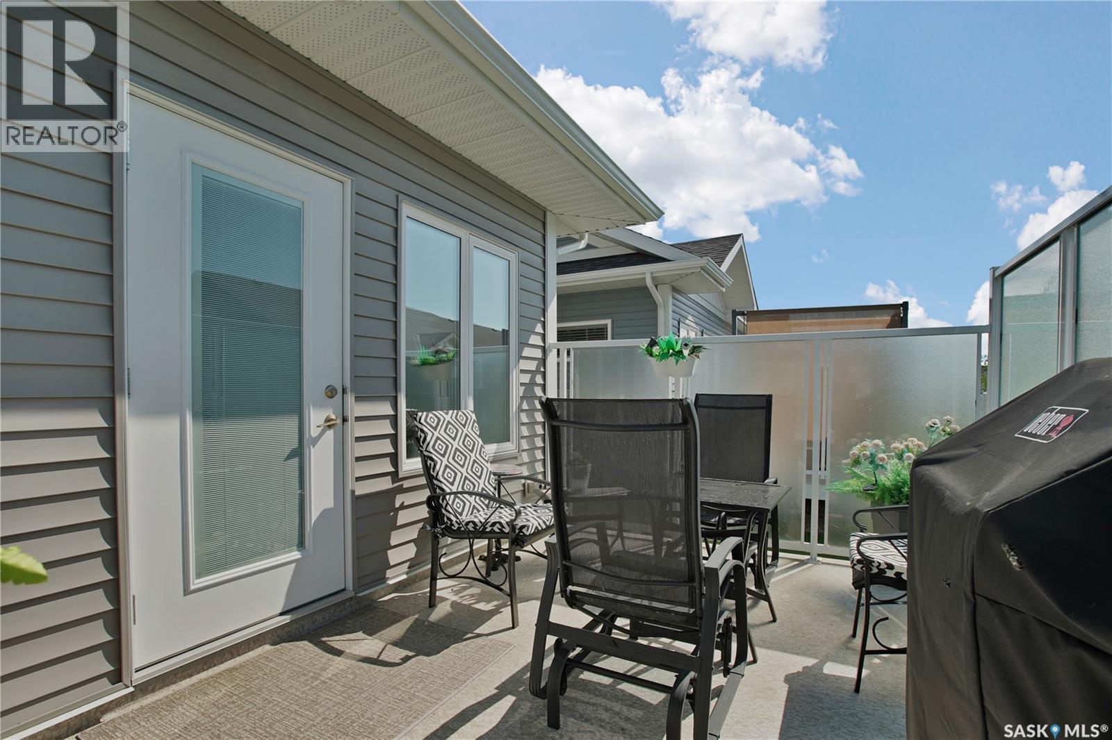 4 437 Palmer Crescent, Warman, SK - Outdoor With Deck Patio Veranda With Exterior