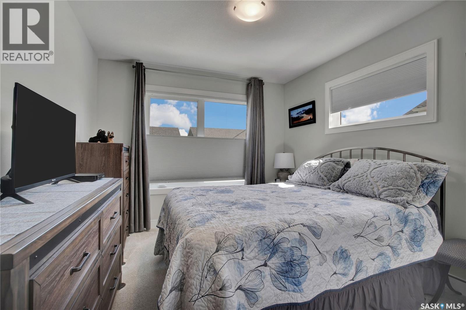 4 437 Palmer Crescent, Warman, SK - Indoor Photo Showing Bedroom