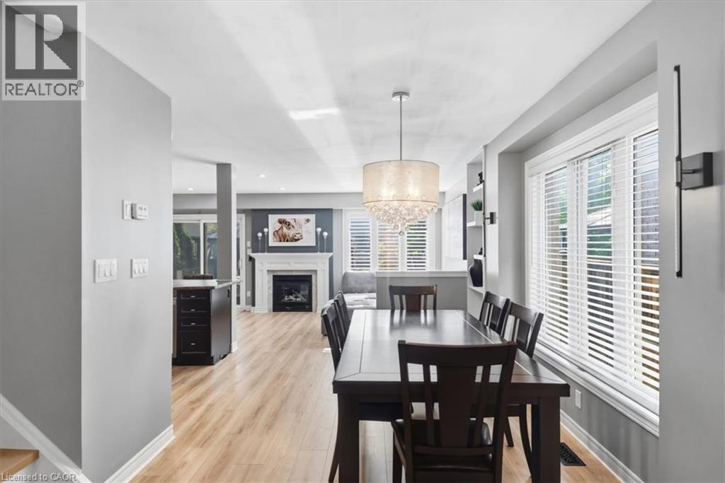 6063 Fausta Boulevard, Niagara Falls, ON - Indoor Photo Showing Dining Room With Fireplace