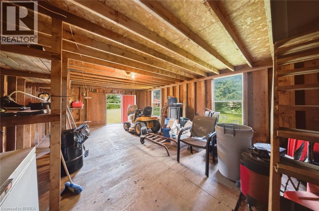 Unfinished interior space featuring exposed wood framing and a wood-finish floor - 1598 Highway No 6, Hamilton, ON - Indoor Photo Showing Other Room
