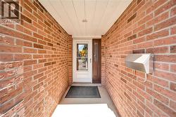 Brick exterior with a covered entry - 