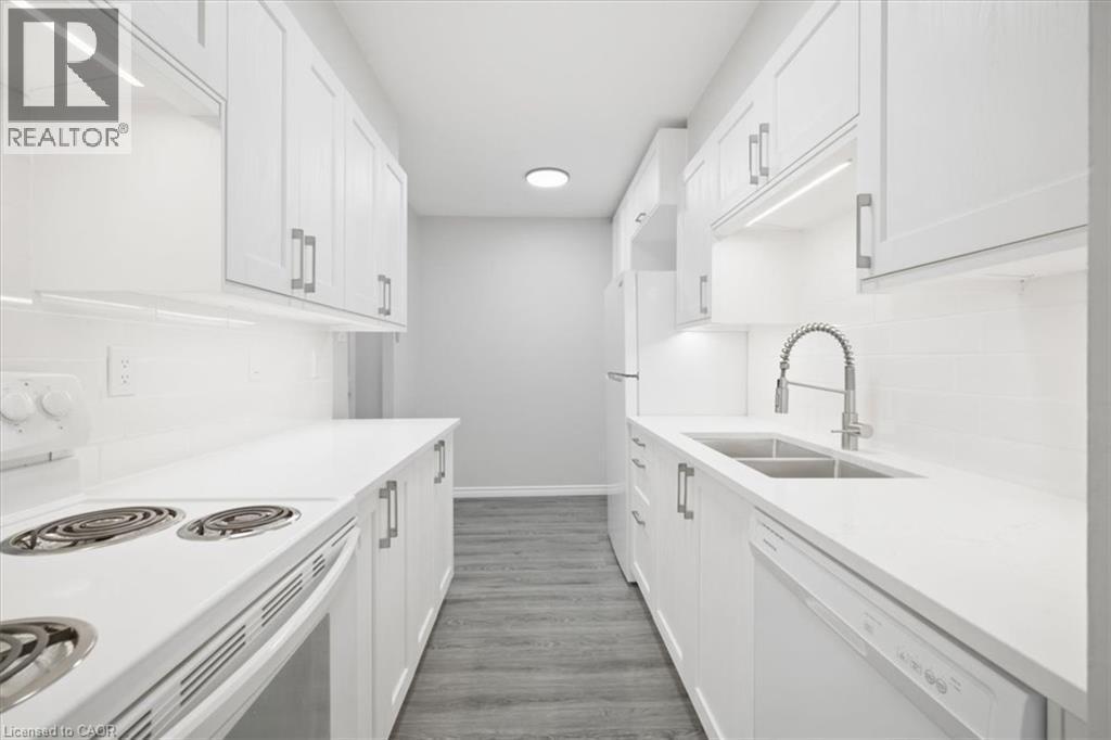 1968 Main Street W Unit# 404, Hamilton, ON - Indoor Photo Showing Kitchen With Double Sink