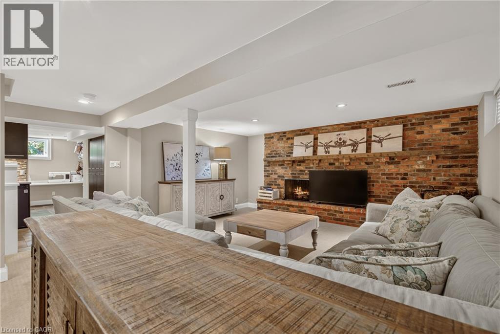 302 Harmony Road, Hamilton, ON - Indoor Photo Showing Living Room With Fireplace