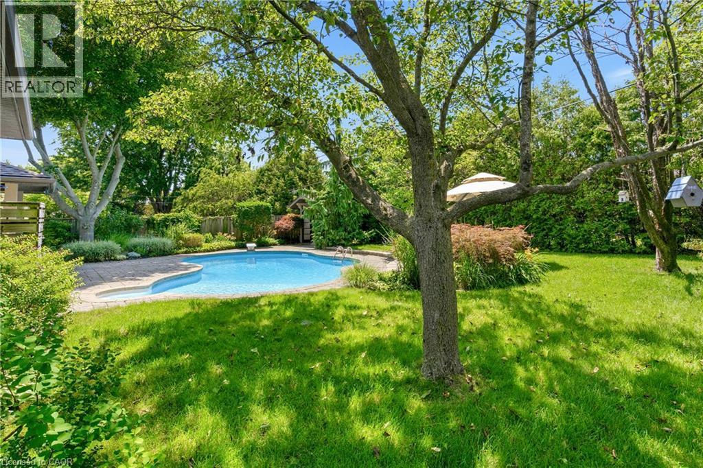 302 Harmony Road, Hamilton, ON - Outdoor With In Ground Pool With Backyard