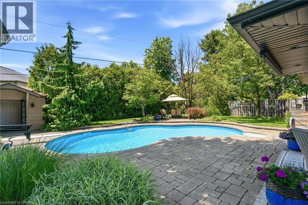 302 Harmony Road, Hamilton, ON - Outdoor With In Ground Pool With Deck Patio Veranda With Backyard