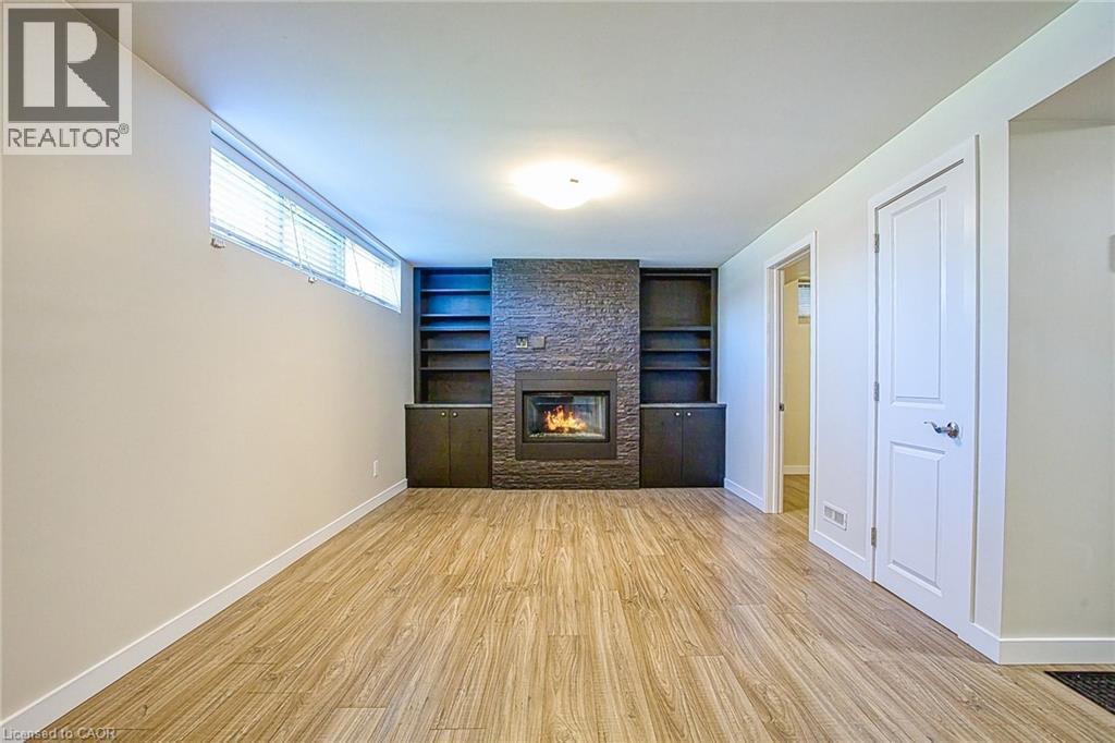 2387 Cyprus Avenue, Burlington, ON - Indoor With Fireplace