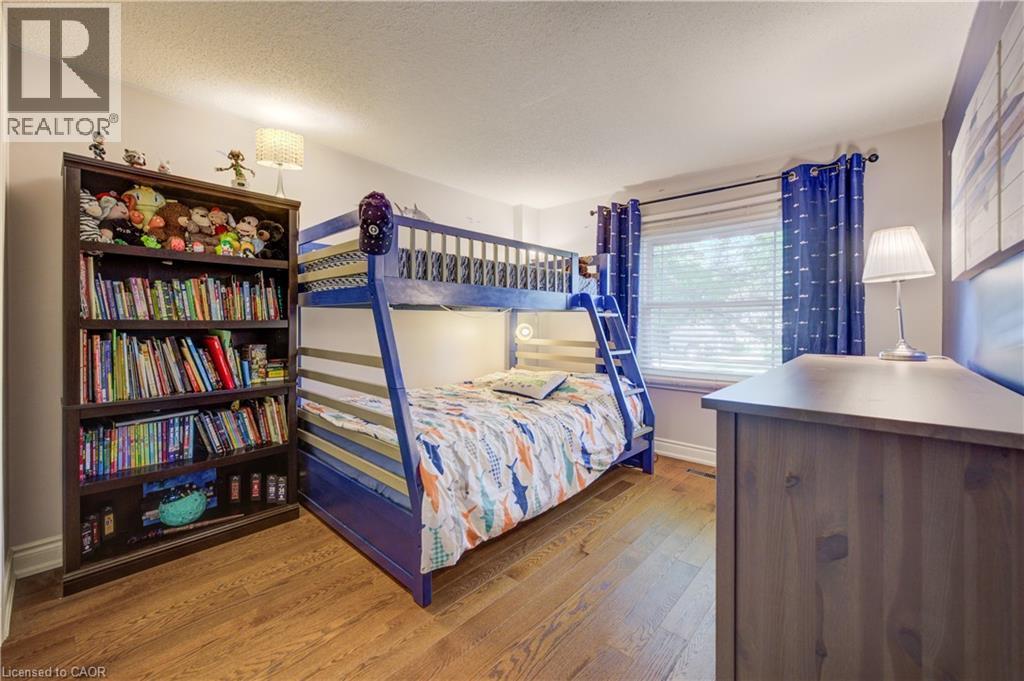 Hardwood-finish flooring throughout - 41 Mcniven Road, Ancaster, ON - Indoor Photo Showing Bedroom