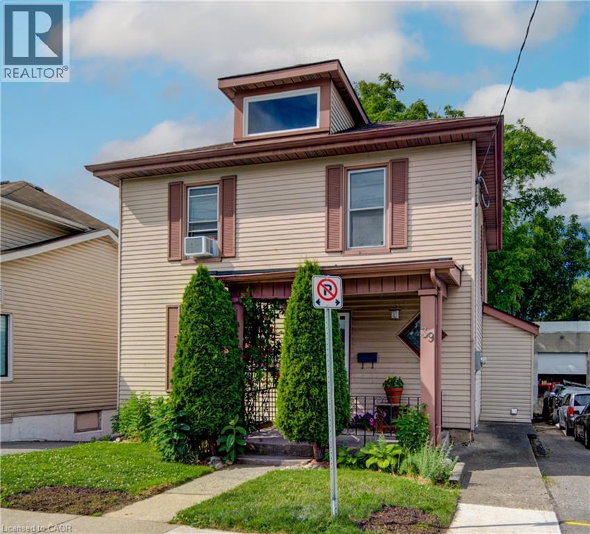 Two-story residence featuring light-colored siding and a brown trim - 39 Kerr Street, Cambridge, ON - Outdoor With Exterior