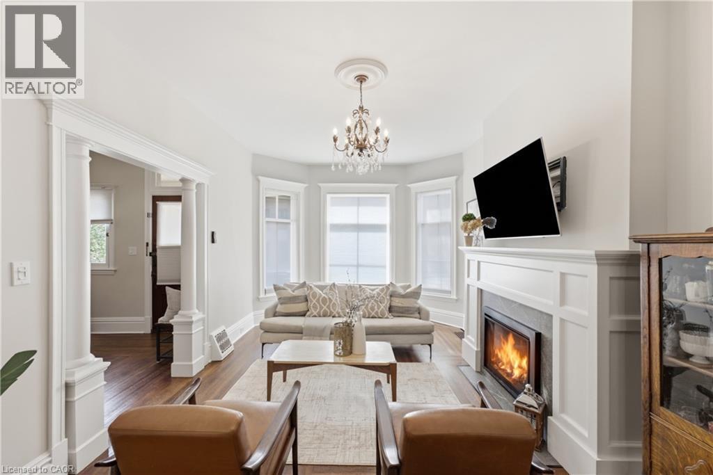 2 Cottage Avenue, Hamilton, ON - Indoor Photo Showing Living Room With Fireplace