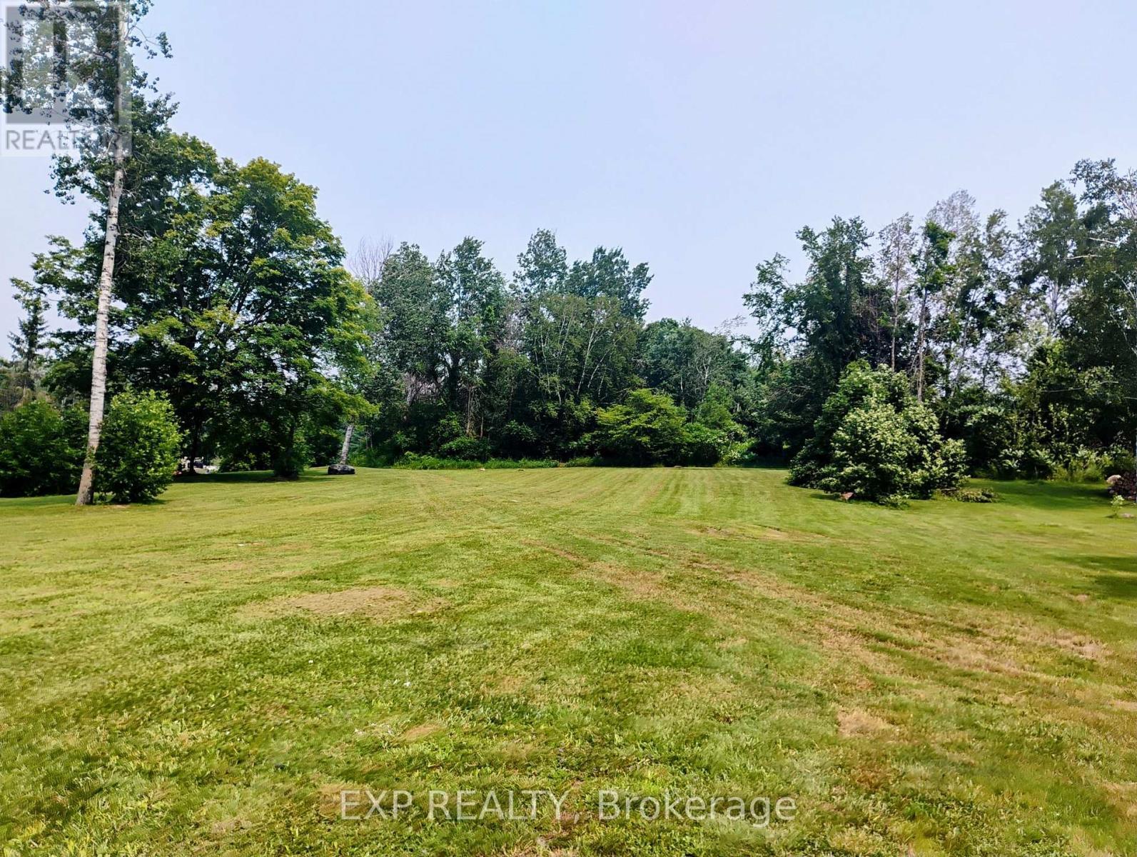 Greenspace that the lot backs onto. - 94 Simcoe Road, Ramara, ON