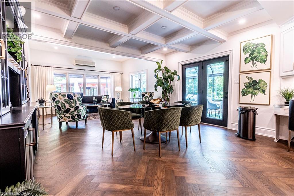 Herringbone wood-finish flooring across an open-concept living space - 76 Adriatic Boulevard, Hamilton, ON - Indoor