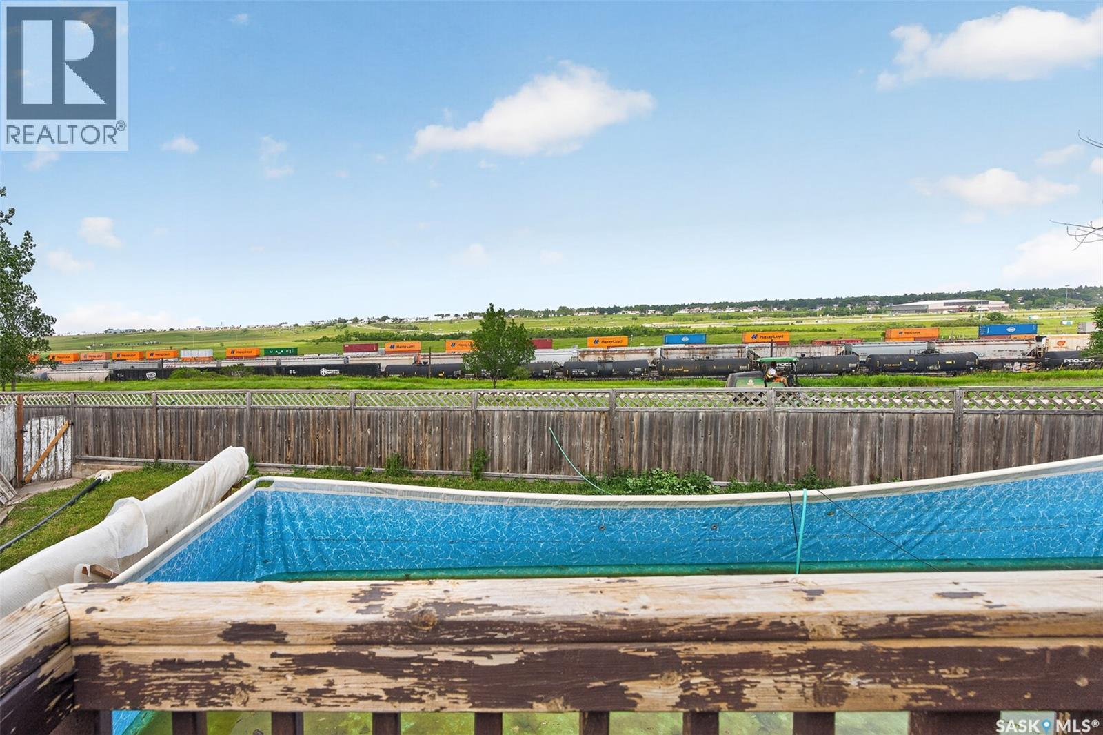 1355 Manitou Crescent, Moose Jaw, SK - Outdoor With In Ground Pool With View