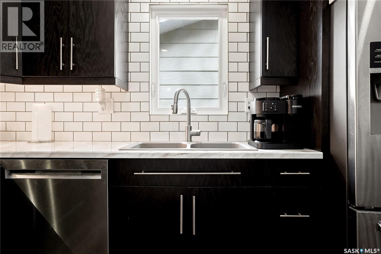 1645 Smith Street, Moose Jaw, SK - Indoor Photo Showing Kitchen With Stainless Steel Kitchen With Double Sink