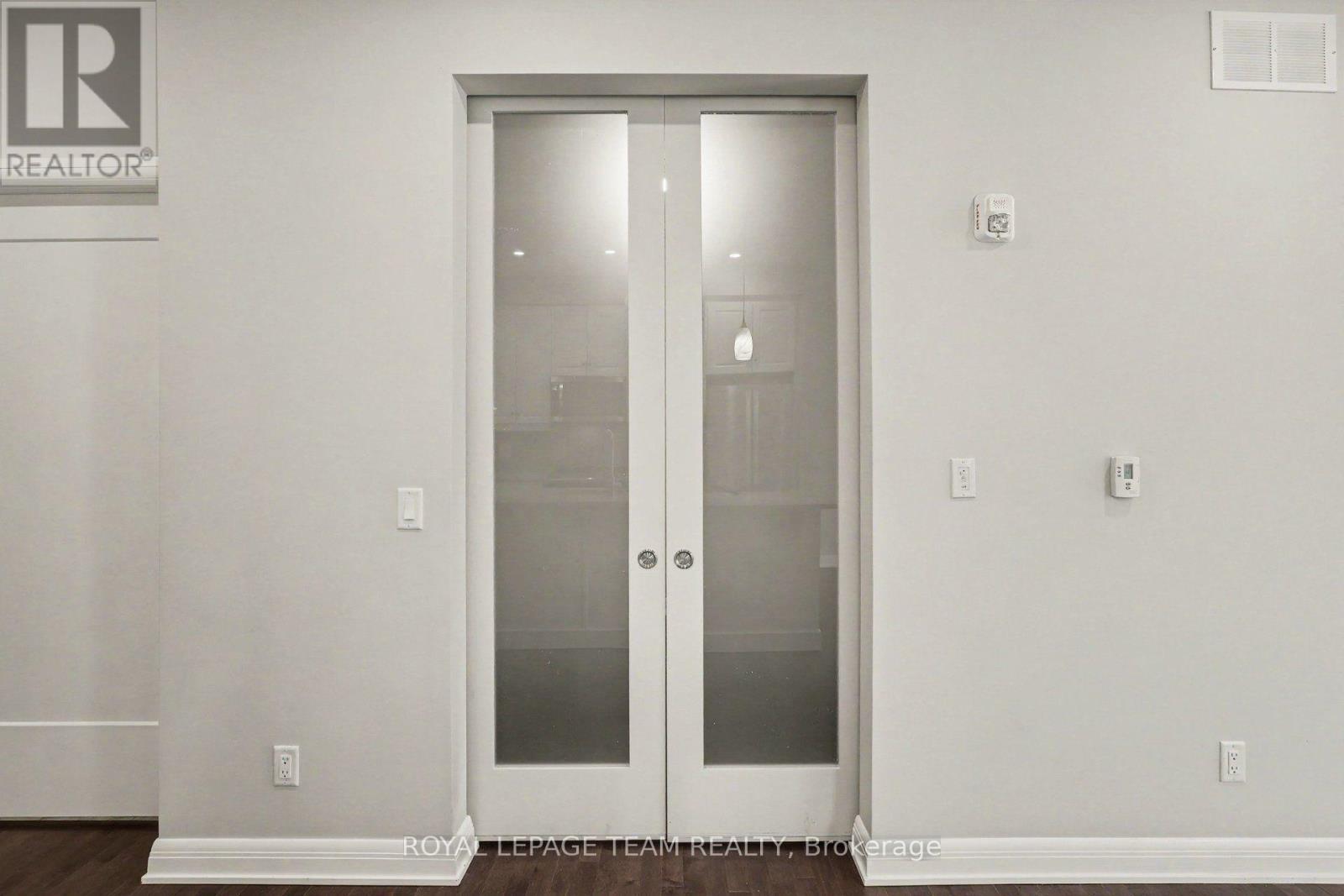 Glass double door to dining room or office - 104 - 190 Boundstone Way, Ottawa, ON - Indoor Photo Showing Other Room