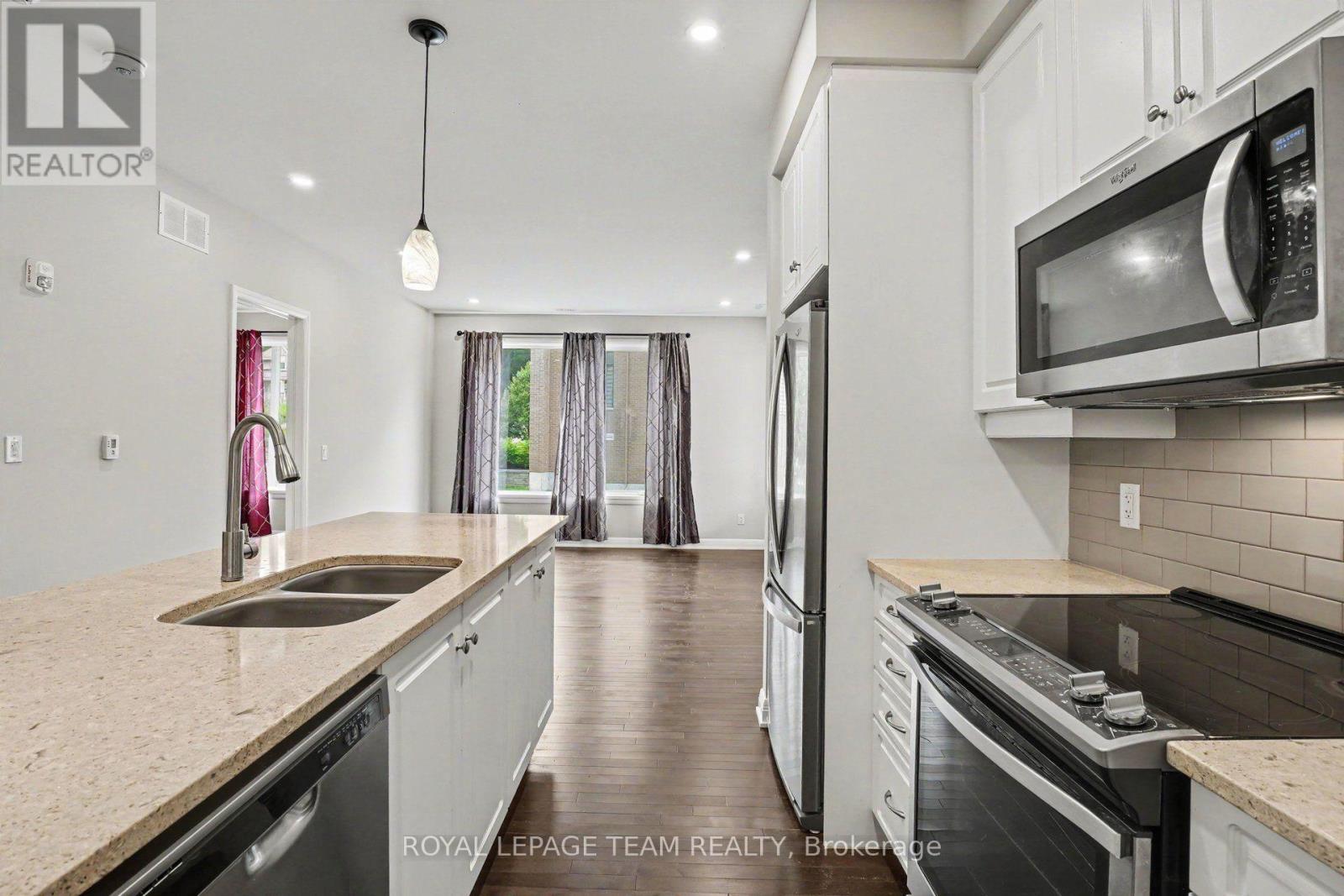 104 - 190 Boundstone Way, Ottawa, ON - Indoor Photo Showing Kitchen With Double Sink With Upgraded Kitchen